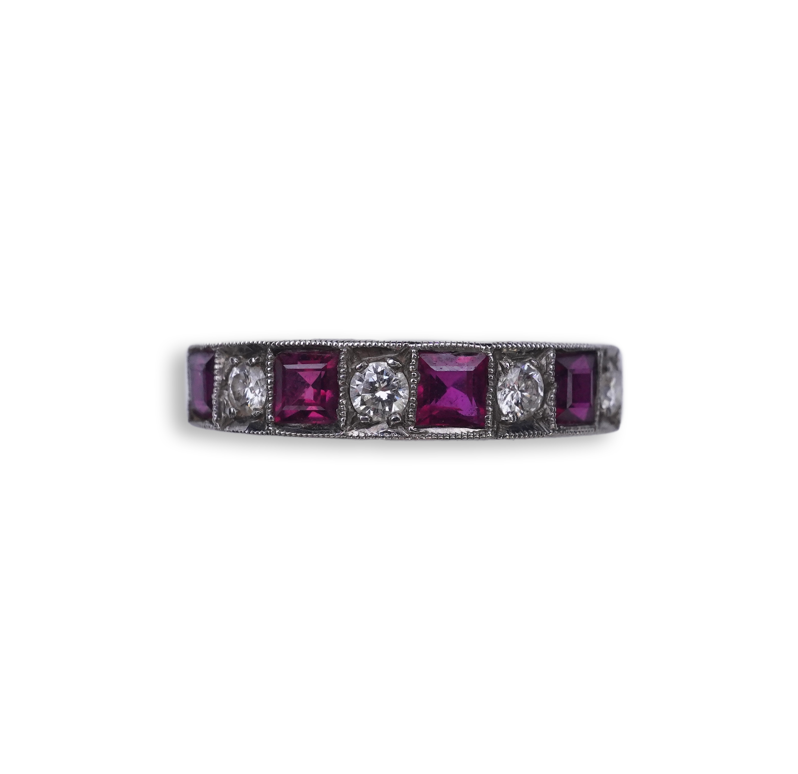 A ruby and diamond half eternity ring